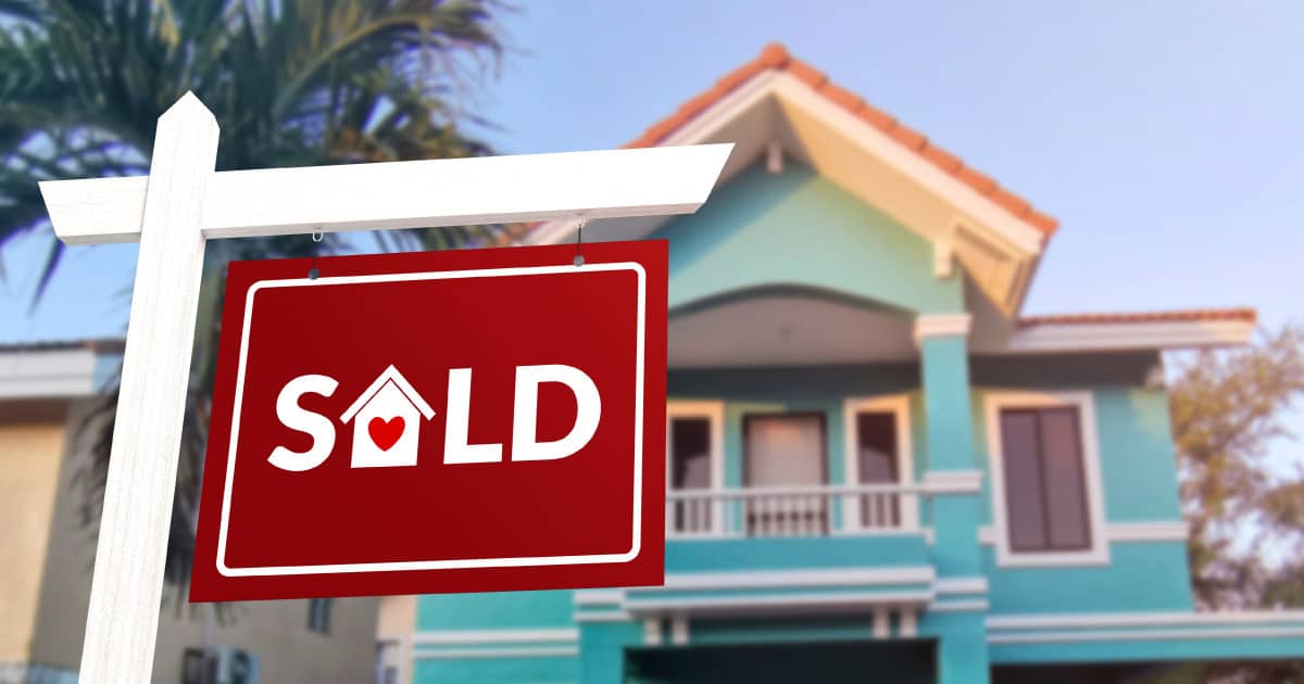 real estate agent sold sign